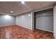Bedroom features tile flooring, neutral paint and closet for storage at 5621 Wildwood Trl, Lithonia, GA 30038