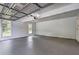 Spacious two car garage with room for storage and natural lighting at 5621 Wildwood Trl, Lithonia, GA 30038