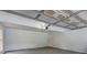 Spacious garage with ample room for parking and storage at 5621 Wildwood Trl, Lithonia, GA 30038