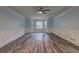Inviting living room boasts neutral walls, wood-look flooring, and trim at 5621 Wildwood Trl, Lithonia, GA 30038