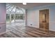 This sunroom is filled with light and has a lovely view of the backyard at 5621 Wildwood Trl, Lithonia, GA 30038