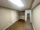 Finished basement with recessed lighting and wood flooring at 1263 Shoreham Dr, Atlanta, GA 30349