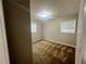 Standard bedroom with neutral walls and brown carpet features a double window at 1263 Shoreham Dr, Atlanta, GA 30349