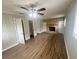Spacious living room with wood floors and a brick fireplace at 1263 Shoreham Dr, Atlanta, GA 30349