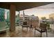 Enjoy the city views from this balcony with chairs and a small table at 20 10Th Nw St # 2003, Atlanta, GA 30309