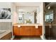 Modern bathroom with double vanities, sleek fixtures, and walk-in shower at 20 10Th Nw St # 2003, Atlanta, GA 30309