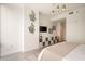 Modern bedroom with stylish decor, a TV, and ample storage for organized living at 20 10Th Nw St # 2003, Atlanta, GA 30309