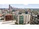 Stunning daytime city view featuring modern architecture, skyscrapers, and lush green spaces at 20 10Th Nw St # 2003, Atlanta, GA 30309