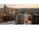 Beautiful city view at sunset featuring modern architecture, skyscrapers, and a colorful sky at 20 10Th Nw St # 2003, Atlanta, GA 30309