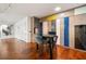 Dining area featuring custom colorful cabinets, hardwood floors and modern track lighting at 20 10Th Nw St # 2003, Atlanta, GA 30309