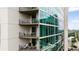 Exterior architectural view showing multiple balconies, with seating, overlooking the city at 20 10Th Nw St # 2003, Atlanta, GA 30309