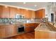 Well-equipped kitchen featuring granite countertops, stainless steel appliances, and ample cabinetry at 20 10Th Nw St # 2003, Atlanta, GA 30309