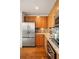 Modern kitchen with stainless steel appliances, granite countertops, and ample cabinet space at 20 10Th Nw St # 2003, Atlanta, GA 30309