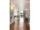 Open-concept living area with dining space, balcony access, and stylish design elements at 20 10Th Nw St # 2003, Atlanta, GA 30309