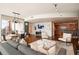 Spacious living room showcasing an open floorplan, modern furniture, and a hardwood flooring at 20 10Th Nw St # 2003, Atlanta, GA 30309