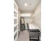 Versatile office closet featuring a built-in desk, shelving, and ample storage space at 20 10Th Nw St # 2003, Atlanta, GA 30309