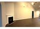 Bright living room featuring vaulted ceilings and a fireplace at 210 Park Place Trl, Social Circle, GA 30025