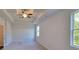 Large main bedroom featuring a trey ceiling and lots of natural light at 210 Park Place Trl, Social Circle, GA 30025