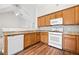 Well-equipped kitchen boasting wooden cabinets, modern appliances, and ample counter space at 5478 Somer Mill Rd, Douglasville, GA 30134