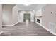 Bonus room with a shiplap fireplace and neutral walls at 6351 Granbury Nw Walk, Acworth, GA 30101