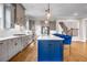 Spacious kitchen with gray cabinets, a center island, and stainless steel appliances at 6351 Granbury Nw Walk, Acworth, GA 30101