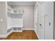 Mudroom area featuring built-in bench with storage and coat hooks at 6351 Granbury Nw Walk, Acworth, GA 30101