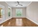 Empty office space featuring hardwood floors, bright windows, and clean, neutral walls at 6351 Granbury Nw Walk, Acworth, GA 30101