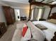 Primary bedroom with a four-poster bed and sitting area at 2122 Riverbirch Ct, Lawrenceville, GA 30044