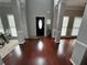 Inviting foyer with hardwood floors, soaring ceilings, and abundant natural light at 2122 Riverbirch Ct, Lawrenceville, GA 30044
