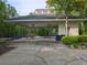 Exterior of covered pavilion with picnic tables, surrounded by trees at 2122 Riverbirch Ct, Lawrenceville, GA 30044