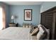 Tranquil bedroom with a view of the window and an eye-catching picture frame at 2122 Riverbirch Ne Ct, Lawrenceville, GA 30044