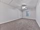 Bright bedroom with plush carpeting, ceiling fan, closet, and window for natural light at 405 Sable Trace Cv, Acworth, GA 30102