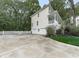 Charming home with a two-car garage, white picket fence, and lush landscaping at 405 Sable Trace Cv, Acworth, GA 30102