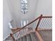 Bright foyer features wood and carpet flooring, chandelier, and large windows that provide natural light at 405 Sable Trace Cv, Acworth, GA 30102
