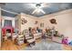 A colorful and fun bedroom showcases -friendly décor and a playful gray rug at 420 Bear Cub Path, Social Circle, GA 30025