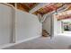 Unfinished basement with concrete floor, exposed ceiling, and stairs leading to the upper level at 4811 Nevilly Way, Marietta, GA 30066