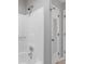 Bathroom featuring tub shower combo and decorative access door at 4811 Nevilly Way, Marietta, GA 30066