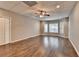 Finished basement featuring wood-look floors, drop ceiling and multiple windows for natural light at 5195 Stefan Ridge Way, Buford, GA 30519
