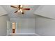 Spacious bedroom featuring high vaulted ceilings, ceiling fan and light gray wall paint at 5195 Stefan Ridge Way, Buford, GA 30519