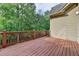 Back deck offering backyard and wooded views at 5195 Stefan Ridge Way, Buford, GA 30519