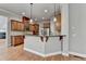 Gourmet kitchen with wood cabinets, granite countertops, and stainless steel appliances at 5195 Stefan Ridge Way, Buford, GA 30519