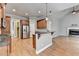 Spacious kitchen featuring stainless steel appliances and granite countertops with bar seating at 5195 Stefan Ridge Way, Buford, GA 30519