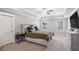 Spacious bedroom featuring a trey ceiling, fan, and large windows at 1702 Prospect Way, Conyers, GA 30094