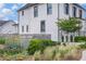 Charming home showcasing manicured landscaping and a traditional architectural design at 1702 Prospect Way, Conyers, GA 30094