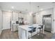 Modern kitchen featuring stainless steel appliances, a breakfast bar, and pendant lighting at 1702 Prospect Way, Conyers, GA 30094