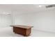 Basement features an unfinished area with a desk at 22 Oakwood Hills Dr, Suwanee, GA 30024