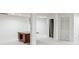 Spacious basement featuring a large open area with white walls and support pillars at 22 Oakwood Hills Dr, Suwanee, GA 30024