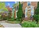 Charming brick home with well-manicured landscaping, and a brick walkway at 22 Oakwood Hills Dr, Suwanee, GA 30024