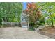 Detached garage with a driveway and landscaping at 22 Oakwood Hills Dr, Suwanee, GA 30024