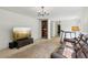 Comfortable living room with a TV, fitness machine, and traditional decor at 22 Oakwood Hills Dr, Suwanee, GA 30024